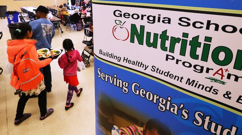 The DeKalb County School District has been delivering and handing out meals to students since buildings were forced to close in March to curb the spread of COVID-19. CURTIS COMPTON/CCOMPTON@AJC.COM
