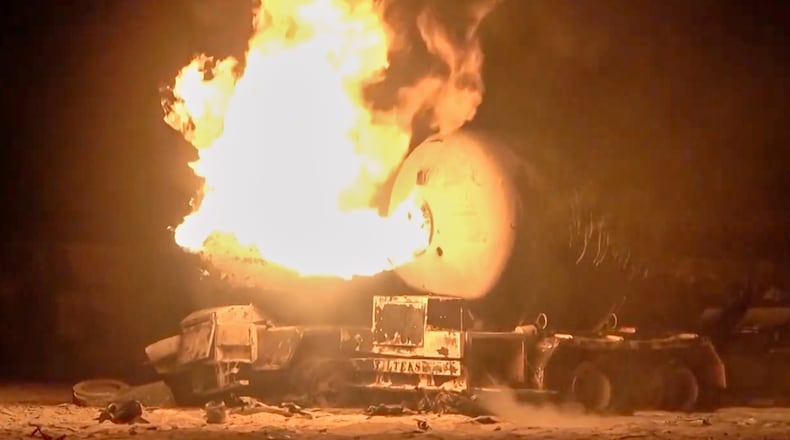 FILE - In this photo taken from video released by Al Masirah TV channel shows a burning oil tanker after U.S. airstrikes targeted the Ras Isa oil port held by Yemen's Houthi rebels in Hodeida, Yemen, April 18, 2025.( Al Masirah TV via AP, File)