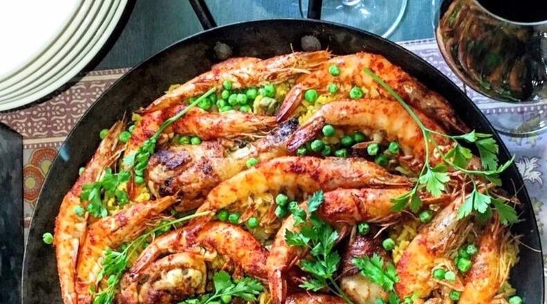 Though you can find a wonderful plate of paella in Spain, you also can create that magic at home by making Catalan Shrimp and Chicken Paella. CONTRIBUTED BY ASHA GOMEZ