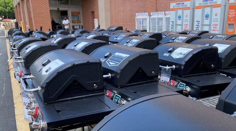 Line-up of popular grills outside Home Depot on Cumberland Parkway. The massive retailer may reap most of its revenue from home improvement, but it also sells items for the owner's enjoyment of the home.