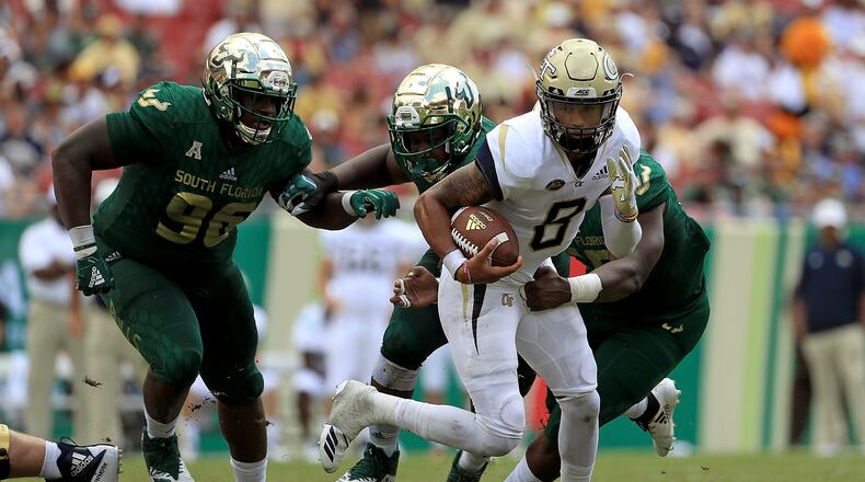 TAMPA, FL - SEPTEMBER 08:  Tobias Oliver #8 of the Georgia Tech Yellow Jackets rushes during a game against the South Florida Bulls at Raymond James Stadium on September 8, 2018 in Tampa, Florida.  (Photo by Mike Ehrmann/Getty Images)