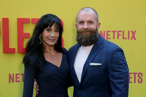 Michael Tiddes and his wife, Kelly, attend the Los Angeles premiere of "Sextuplets" in 2019. (Willy Sanjuan/Invision/AP 2019)