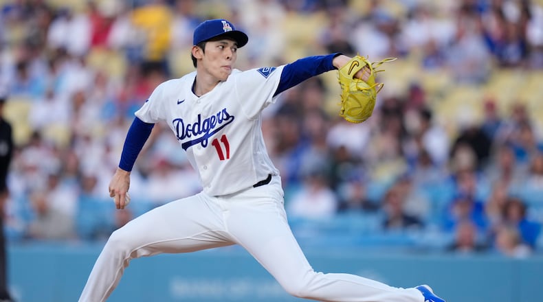 Los Angeles Dodgers starting pitcher Roki Sasaki throws to the plate during the first inning of a baseball game against the Los Angeles Angels, Friday, June 5, 2026, in Los Angeles. (AP Photo/Mark J. Terrill)