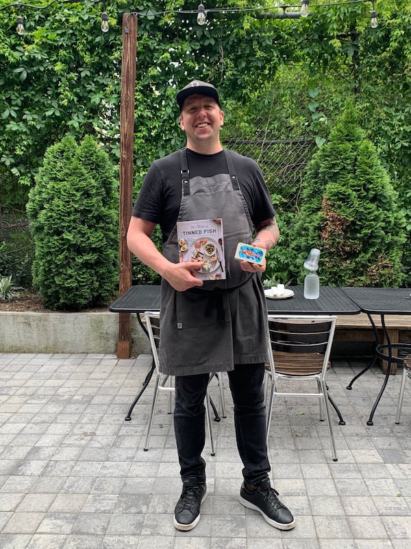 Atlanta native Chris McDade is the chef and co-owner of Popina in Brooklyn, New York, and the author of the newly released cookbook "The Magic of Tinned Fish" (Artisan Books, $24.95). (Courtesy of Samantha Lewis)