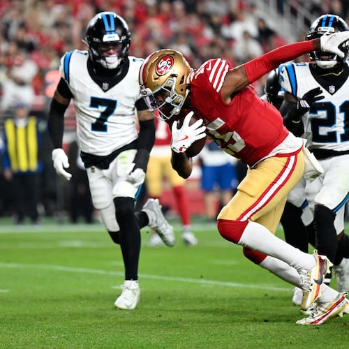San Francisco 49ers wide receiver Jauan Jennings runs for a touchdown against the Carolina Panthers during the first half an NFL football game, Monday, Nov. 24, 2025, in Santa Clara, Calif. (AP Photo/Eakin Howard)