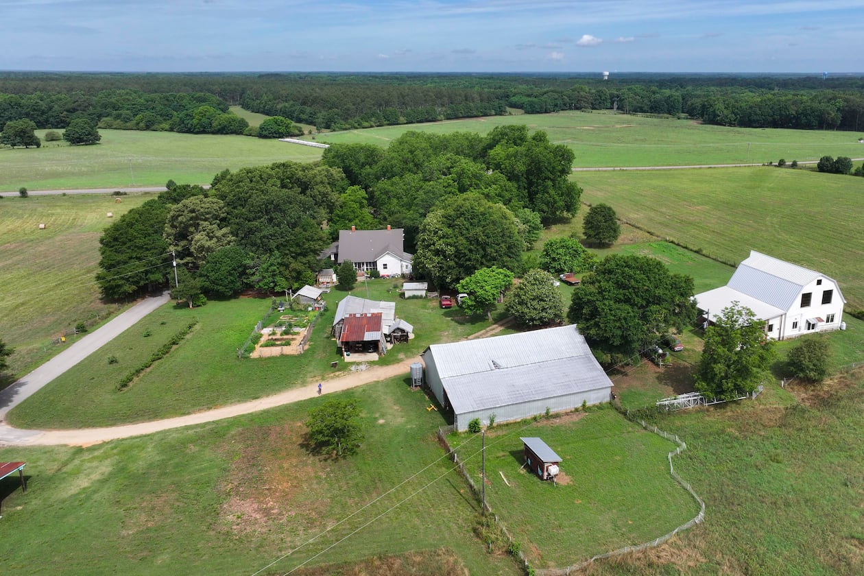 An aerial image shows the Breedlove family farm near Watkinsville in Oconee County on Thursday, May 29, 2026. A proposed highway bypass would cut through the 350-acre property. (Miguel Martinez/AJC)