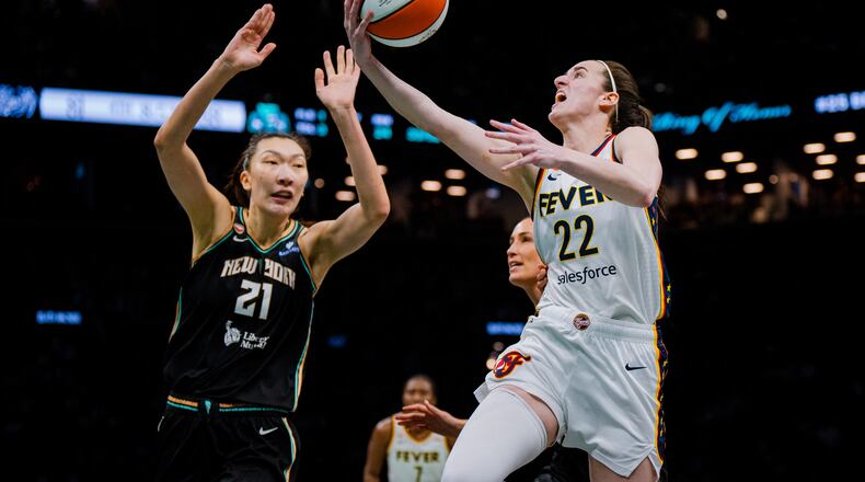 Indiana Fever guard Caitlin Clark (22) shoots a two-pointer during the second half of a WNBA basketball game against the New York Liberty, Saturday, Aug. 22, 2026, in New York. (AP Photo/Angelina Katsanis)