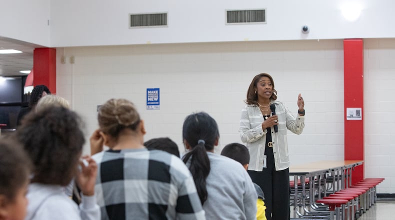 Yngrid Huff, deputy chief operations officer of Fulton County Schools, addresses questions and tries to clarify the process of plans to close Spalding Drive Elementary School and Parklane Elementary School on Wednesday, Nov. 6, 2024. (Jenni Girtman for the AJC)