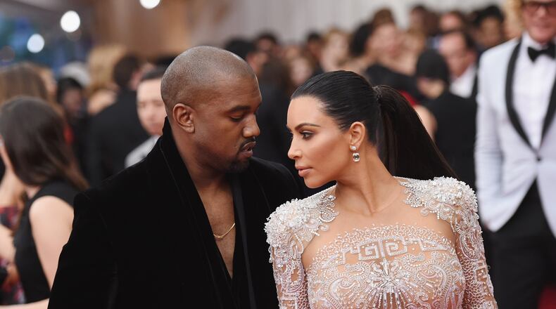 NEW YORK, NY - MAY 04: Kanye West (L) and Kim Kardashian attend the "China: Through The Looking Glass" Costume Institute Benefit Gala at the Metropolitan Museum of Art on May 4, 2015 in New York City. (Photo by Mike Coppola/Getty Images)