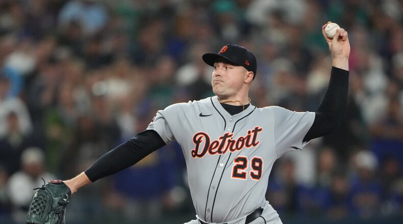 FILE - Detroit Tigers pitcher Tarik Skubal throws during the first inning in Game 5 of baseball's American League Division Series against the Seattle Mariners, Oct. 10, 2025, in Seattle. (AP Photo/Lindsey Wasson, File)