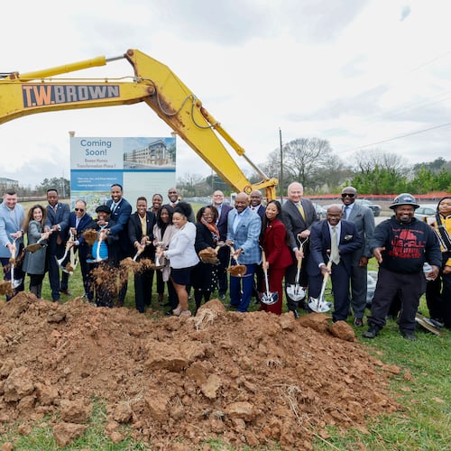 Atlanta Mayor Andre Dickens (center) along with Atlanta Housing President and CEO Terri M. Lee (right of Dickens), participated in the groundbreaking of the mixed-homes redevelopment of Bowen Homes phase 1 on Wednesday, March 5, 2025. (Miguel Martinez/AJC)