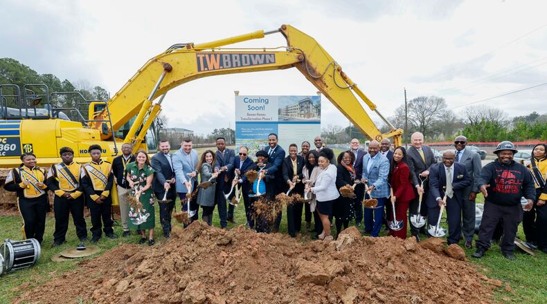 Atlanta Mayor Andre Dickens (center) along with Atlanta Housing President and CEO Terri M. Lee (right of Dickens), participated in the groundbreaking of the mixed-homes redevelopment of Bowen Homes phase 1 on Wednesday, March 5, 2025. (Miguel Martinez/AJC)