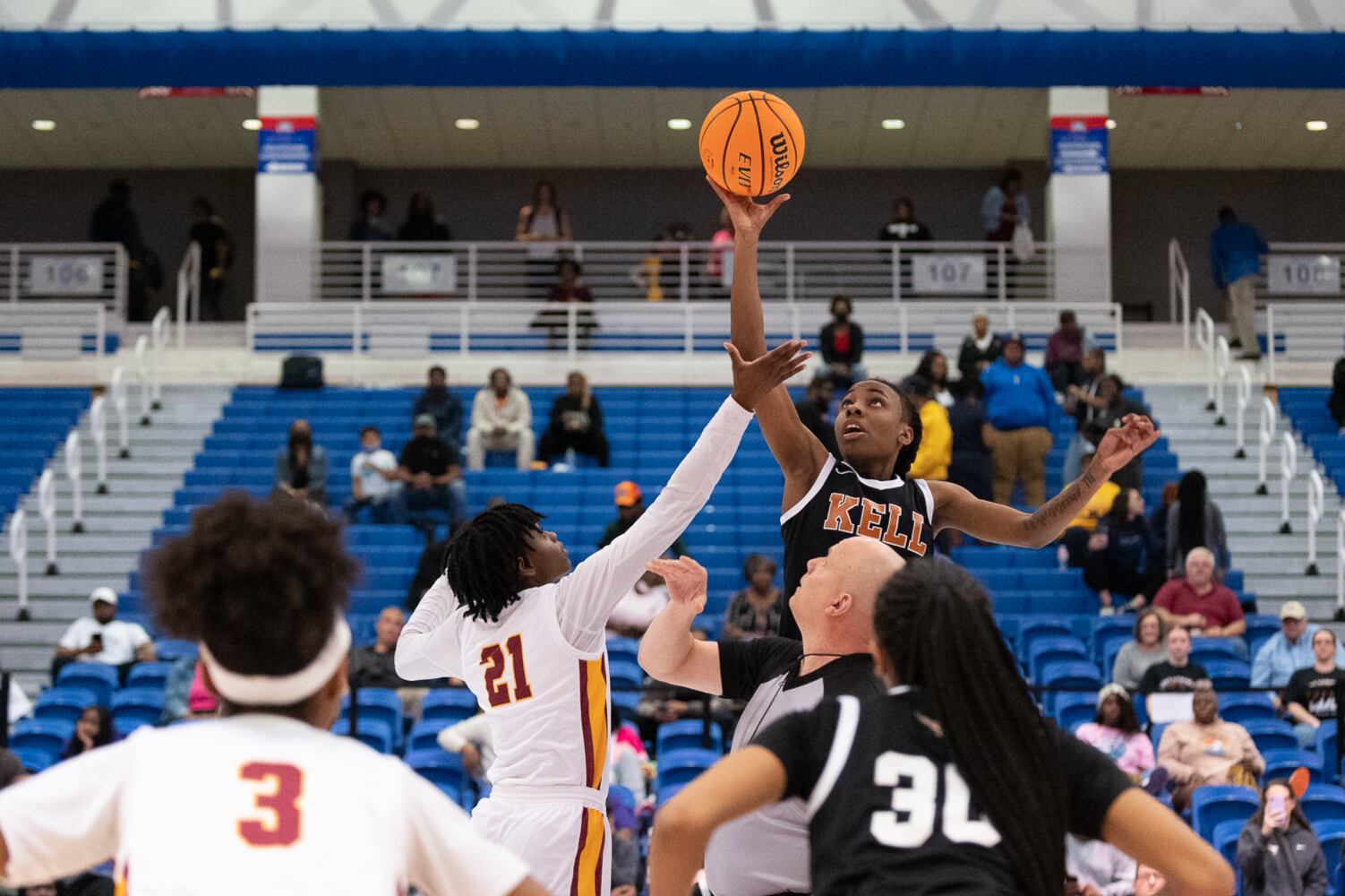 Kell wins the tipoff against Jackson. Jamie Spaar for the Atlanta Journal-Constitution