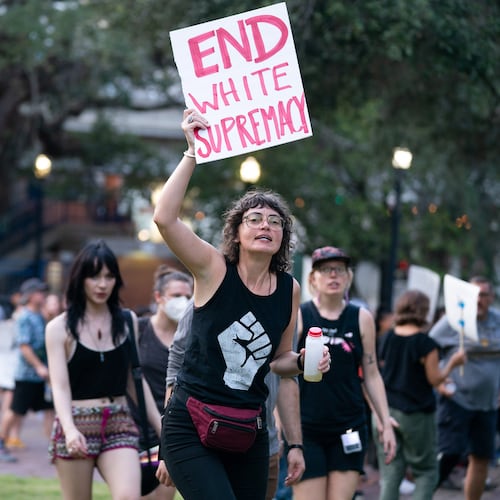 Demonstrators start a march after a rally against white supremacy at James Weldon Johnson Park in Jacksonville, Florida. Police say that the attack by a gunman on Black customers at a Dollar General Store store over the weekend is being investigated as a hate crime. (Sean Rayford/Getty Images/TNS 2023)