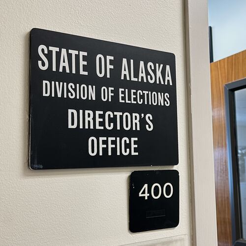 FILE - A sign hangs outside the director's office of the Alaska Division of Elections, March 19, 2026, in Juneau, Alaska. (AP Photo/Becky Bohrer, File)