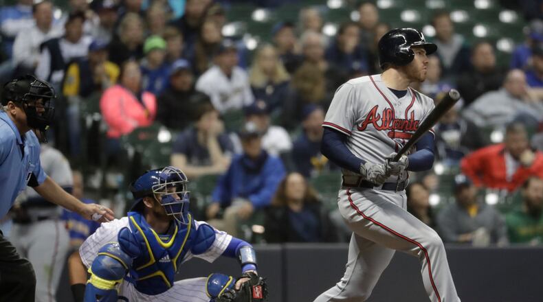 Atlanta Braves' Freddie Freeman hits a two-run home run during the ninth inning of a baseball game against the Milwaukee Brewers Friday, April 28, 2017, in Milwaukee. (AP Photo/Morry Gash)