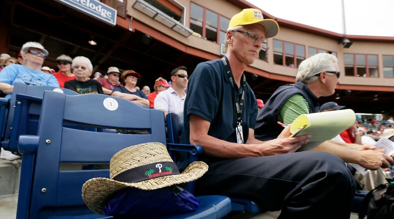 A hat sits on empty seat to honor former Philadelphia Phillies manager Jim Fregosi before an exhibition baseball game between the Phillies and the Atlanta Braves Wednesday, March 5, 2014, in Clearwater, Fla. Fregosi, who served the past 13 seasons as the special assistant to Atlanta Braves general manager Frank Wren, died Feb. 14 after suffering a series of strokes while on a Major League Baseball Alumni cruise in the Cayman Islands.