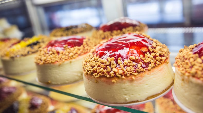 Cheesecake sits for sale in the bakery display counter of Junior's Cheesecake. The restaurant is one of several offering deals for National Cheesecake Day. (Photo by Andrew Burton/Getty Images)