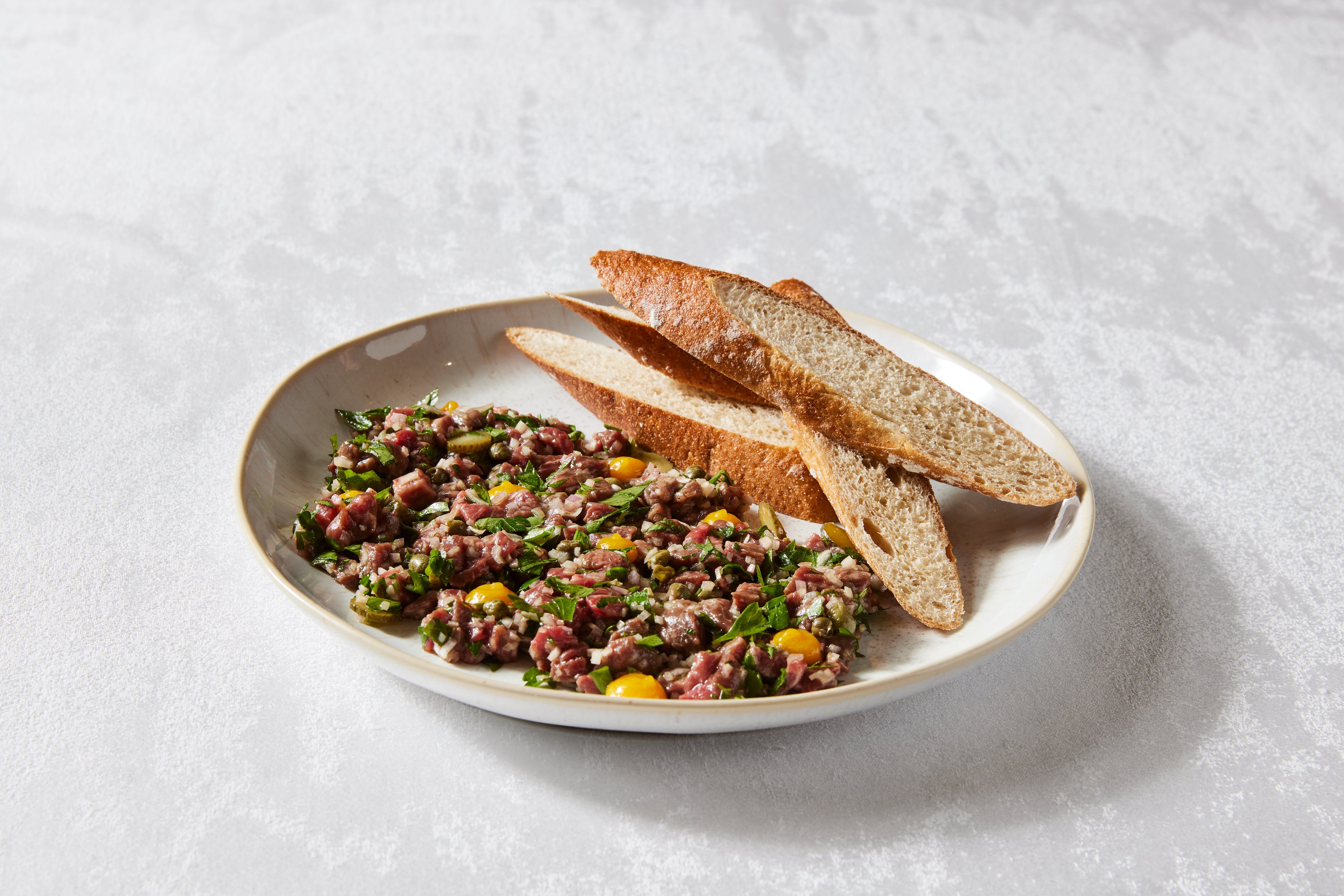 The steak tartare at Brasserie Margot is one of many dishes prepared tableside. (Courtesy of Kathryn McCrary)