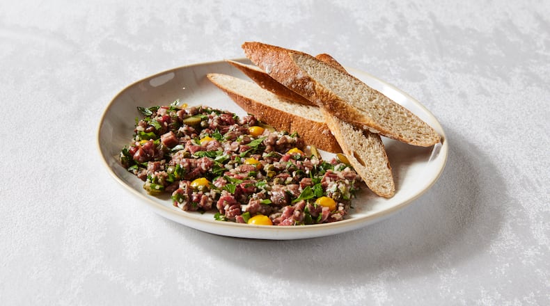 The steak tartare at Brasserie Margot is one of many dishes prepared tableside. (Courtesy of Kathryn McCrary)