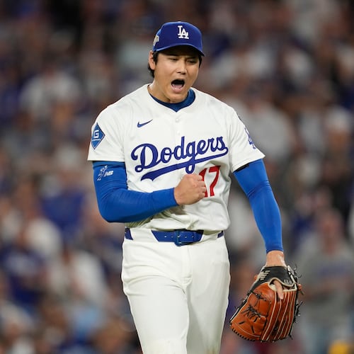 FILE - Los Angeles Dodgers pitcher Shohei Ohtani (17) reacts during Game 4 of baseball's National League Championship Series against the Milwaukee Brewers, Friday, Oct. 17, 2025, in Los Angeles. (AP Photo/Ashley Landis, File)