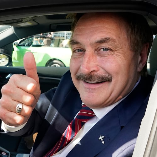 FILE - Mike Lindell gives a thumbs up as he passes by a rally for supporters of former President Donald Trump, April 4, 2023, in West Palm Beach, Fla. (AP Photo/Wilfredo Lee, File)