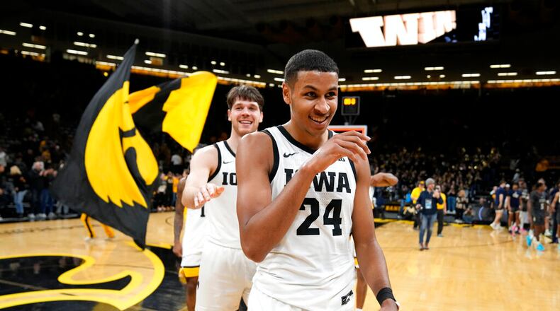 Iowa forward Kris Murray (24) walks off the court after an NCAA college basketball game against Georgia Tech, Tuesday, Nov. 29, 2022, in Iowa City, Iowa. Iowa won 81-65. (AP Photo/Charlie Neibergall)