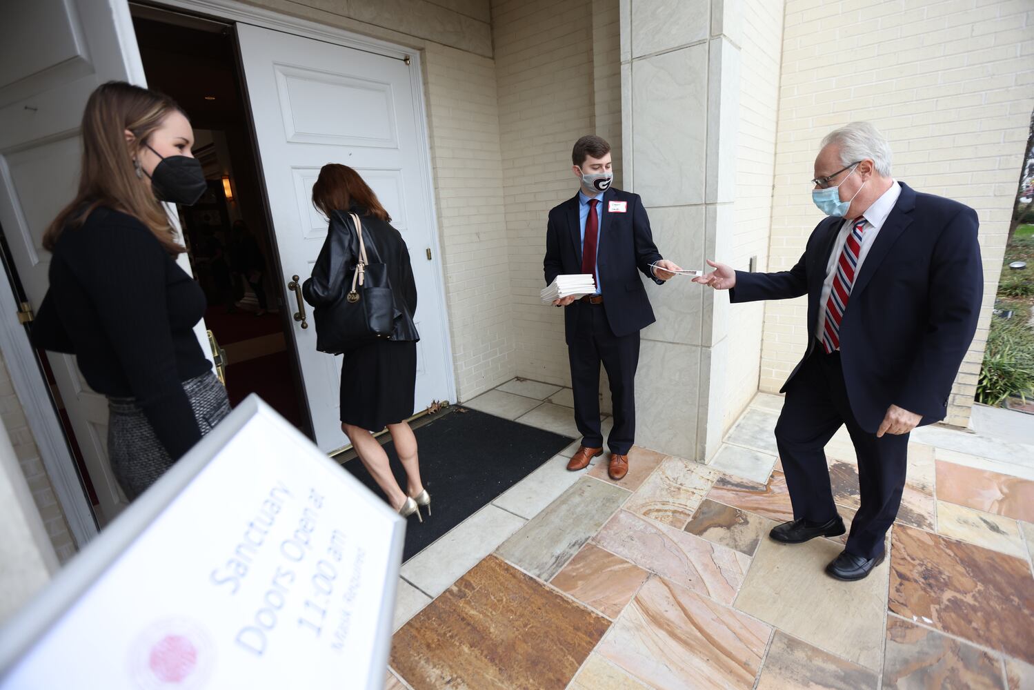 Former Attorney General of Georgia Sam Olens receives a program at United Methodist Church where the memorial service takes place of the Late U.S. Senator Johnny Isakson on Thursday January 6, 2022. Miguel Martinez for The Atlanta Journal-Constitution