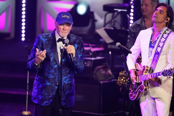 Mike Love, left, and John Stamos perform during the 54th annual Songwriters Hall of Fame induction and awards gala on Thursday, June 12, 2025, at the Marriott Marquis Hotel in New York. (Photo by Charles Sykes/Invision/AP)
