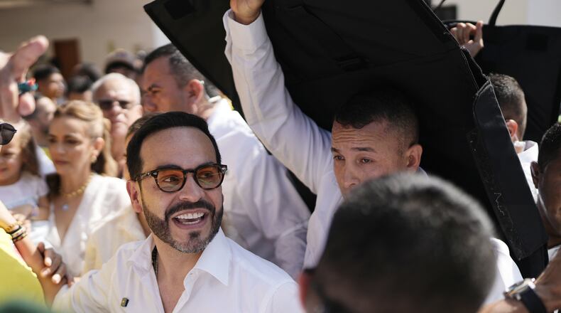 Presidential candidate Abelardo de la Espriella of the Defenders of the Motherland movement depart a polling station after voting during the presidential election in Barranquilla, Colombia, Sunday, May 31, 2026. (AP Photo/Ivan Valencia)