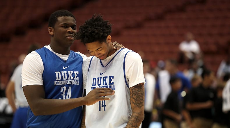 ANAHEIM, CA - MARCH 23: Sean Obi #34 and Brandon Ingram #14 of the Duke Blue Devils share a laugh during practice prior to the west regional of the NCAA Basketball Tournament at Honda Center on March 23, 2016 in Anaheim, California. (Photo by Sean M. Haffey/Getty Images)