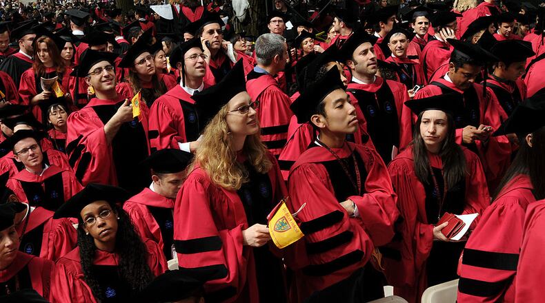 CAMBRIDGE, MA - JUNE 4: Harvard University students attend commencement ceremonies June 4, 2009 in Harvard Yard in Cambridge, Massachusetts. Founded in 1636, this year marks the 358th year of graduation ceremonies at the university, considered the oldest in the nation. (Photo by Darren McCollester/Getty Images)