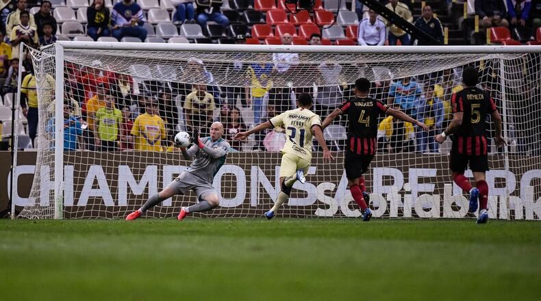 Atlanta United goalkeeper Brad Guzan #1 saves the ball during the first half of the first leg match between Atlanta United FC and Club America in the quarterfinal round of the 2020 Scotiabank Concacaf Champions League at Estadio Azteca in Mexico City, Mexico, on Wednesday March 11, 2020. (Photo by Jacob Gonzalez/Atlanta United)