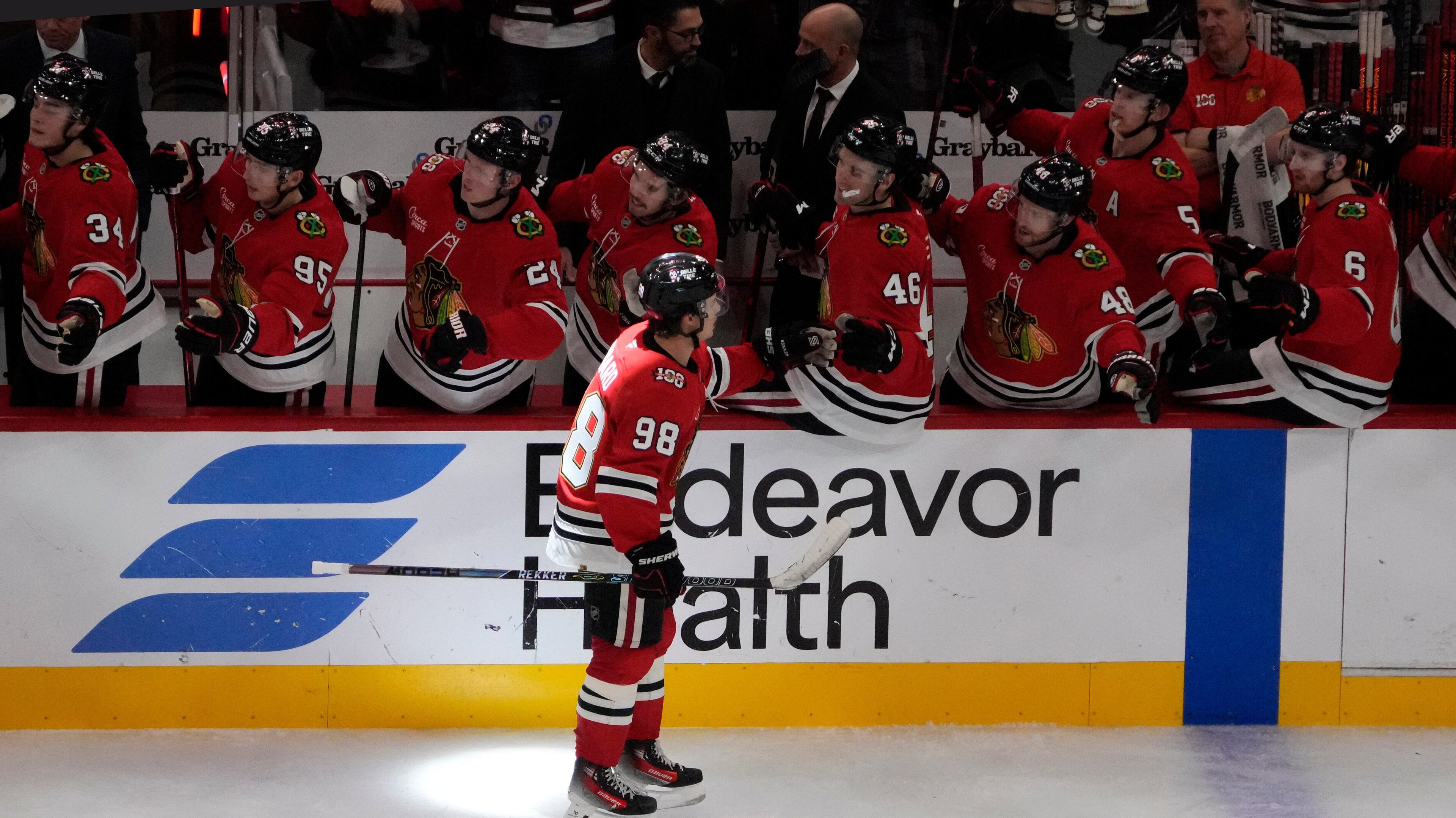 Chicago Blackhawks center Connor Bedard (98) celebrates his goal against the Calgary Flames during the third period of an NHL hockey game Tuesday, Nov. 18, 2025, in Chicago. (AP Photo/David Banks)