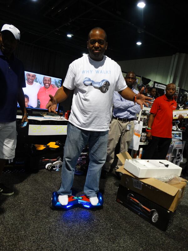 Brian Dennis was selling something called a Glidr with no "e." It's basically a Segway minus the upper body support. There were three types, from $850 to $1,250. He said as of 8 p.m., he had sold 20, well worth the cost of being a vendor. CREDIT: Rodney Ho/ rho@ajc.com