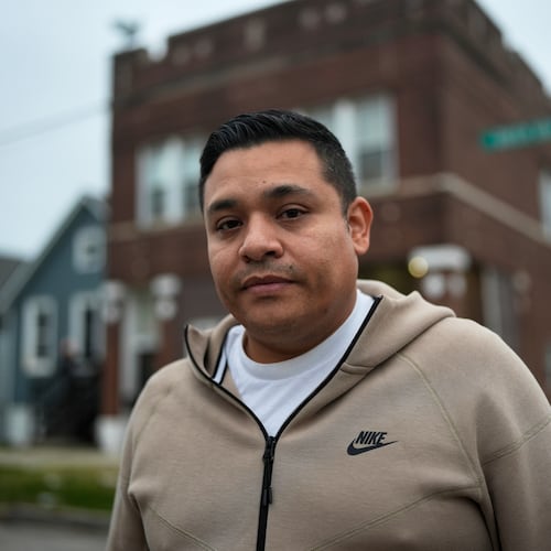 Jose Aguilar, who recorded cell phone video of federal agents chasing and tackling a Black teen in the East Side neighborhood in October, stands outside his family's business Tuesday, Nov. 18, 2025, in Chicago. (AP Photo/Erin Hooley)