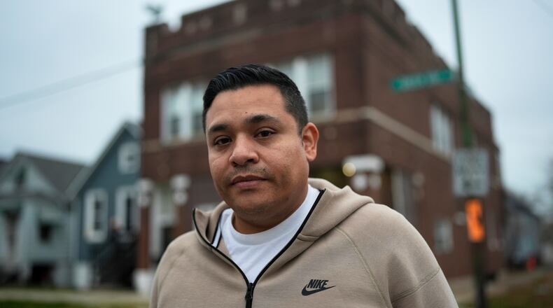 Jose Aguilar, who recorded cell phone video of federal agents chasing and tackling a Black teen in the East Side neighborhood in October, stands outside his family's business Tuesday, Nov. 18, 2025, in Chicago. (AP Photo/Erin Hooley)