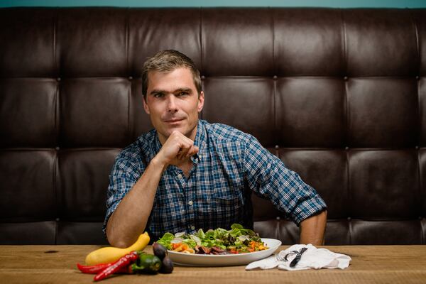 Chef Hugh Acheson teaches a class benefiting the Atlanta Community Food Bank.