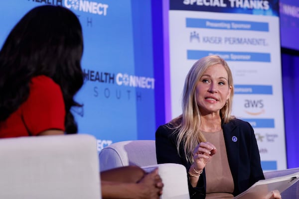 Samantha Brown-Parks, Regional Director of the U.S. Department of Health and Human Services, speaks with new CDC Director Erica Schwartz at the Health Connect South conference at the Georgia Aquarium on Wednesday, Sept. 16, 2026. (Miguel Martinez/AJC)