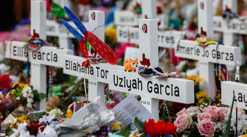A memorial for the 19 children and two adults killed May 24 at Robb Elementary School in Uvalde, Texas, is a reminder of a sad reality in America. (Lola Gomez / Tribune News Service)