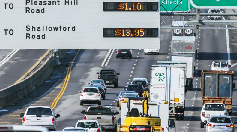 LEDE PHOTO - August 22, 2016 Gwinnett County: The cost to drive the 16-mile stretch of "HOT" express lanes on I-85 southbound in Gwinnett and DeKalb counties increased to a record $13.95 Monday, Aug. 22, 2016 according to the State Road and Tollway Authority. That is the maximum amount allowed by law. The previous record, set in November 2015, was $12. The State Road and Tollway Authority announced earlier this month that toll rates for several parts of I-85's HOT lanes would increase starting Monday. The change is aimed at reducing HOT lane congestion and providing "a more reliable and predictable commute for Peach Pass Customers," The Atlanta Journal-Constitution previously reported. The increase will remain in effect from 7 to 9 a.m. and 4 to 6 p.m. each day. JOHN SPINK /JSPINK@AJC.COM