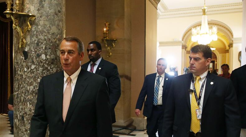 House Speaker John Boehner walks through the halls of Congress before last week's trade votes. (Mark Wilson/Getty Images)