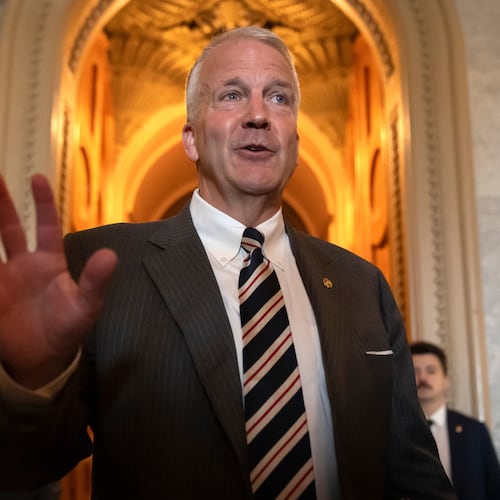 FILE - Sen. Dan Sullivan, R-Alaska, speaks to reporters at the Capitol in Washington, June 30, 2025. (AP Photo/Mark Schiefelbein)