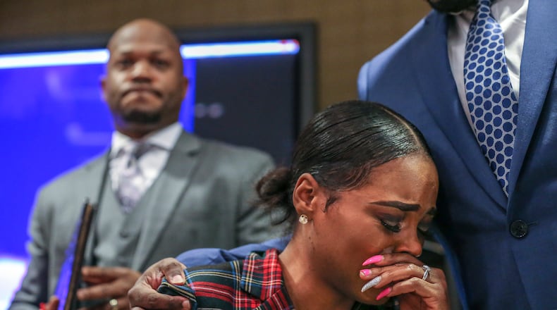 February 12, 2019 Atlanta: Attorney Chris Stewart (left) addresses the media Tuesday morning, Feb. 12, 2019 as his client, Jasmine Eiland (center) is comforted by attorney Joshua Palmer (right). It is the policy of the AJC to not name alleged victims of sexual crimes, but in this case the victim chose to publicly discuss the incident. The woman whose alleged sexual assault inside a popular Midtown nightclub was seen on Facebook has filed a lawsuit, claiming the club did not have adequate security the night of the attack. On Tuesday, the victim's attorneys alleged Opera nightclub failed to monitor certain areas of the club during the Jan. 19 sexual assault. The victim had been celebrating her birthday at the time and was already streaming on Facebook Live when she was attacked. The woman spoke for the first time publicly at a Tuesday morning press conference. It is the policy of the AJC to not name alleged victims of sexual crimes, but in this case the victim chose to publicly discuss the incident. Atlanta police received calls from people who had seen the assault and an investigation was opened. According to police, the video showed the woman on the dance floor while an unidentified man assaulted her. The woman can be heard screaming for the man to stop and calling for help. Atlanta police contacted the man identified in the video but did not immediately make an arrest. Dominique Williams, 34, turned himself in to authorities on Jan. 29 in connection with the sexual assault. He faces an aggravated sodomy charge. JOHN SPINK/JSPINK@AJC.COM