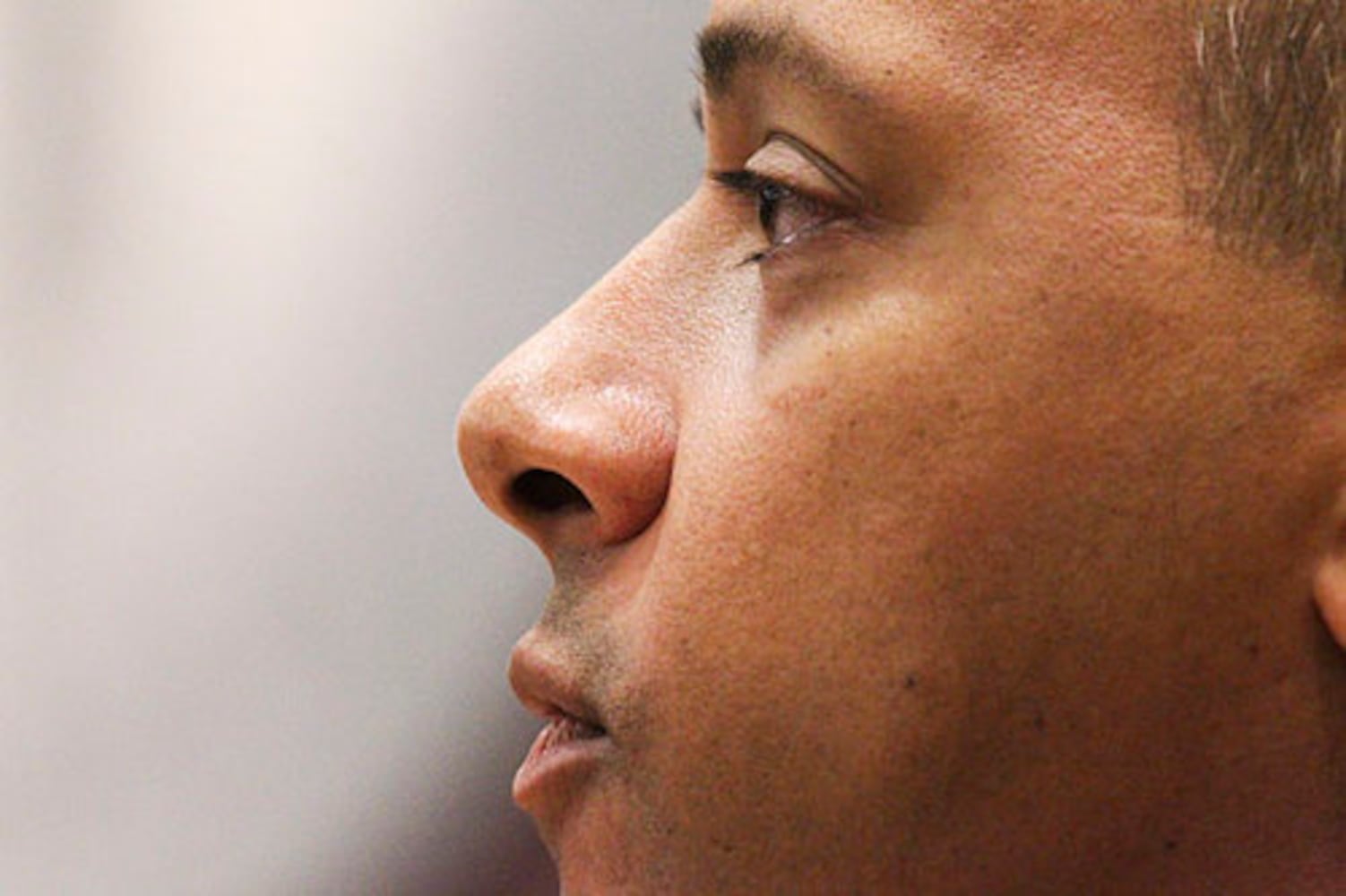 Teen in court, accused of killing cop