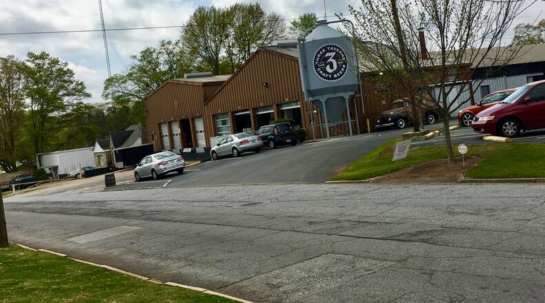 Decatur’s commission has approved rezoning 45 acres on the city’s east side to mixed use, which sets the stage for a coordinated series of developments over the next 20 years. Part of the long-range plan includes extending several dead end streets including New Street, shown here. Many of the district’s older buildings, including those housing the Three Taverns beer plant, will remain. There are currently no developers proposing any projects. Bill Banks file photo for the AJC
