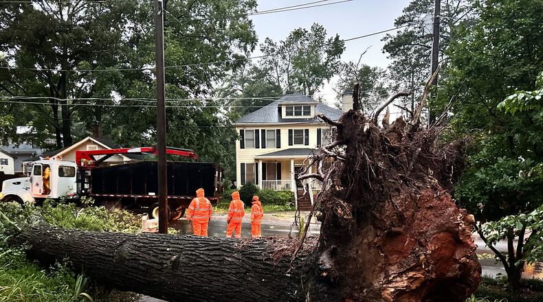 Strong storms brought down trees, including one in Decatur that blocked a road Friday evening.