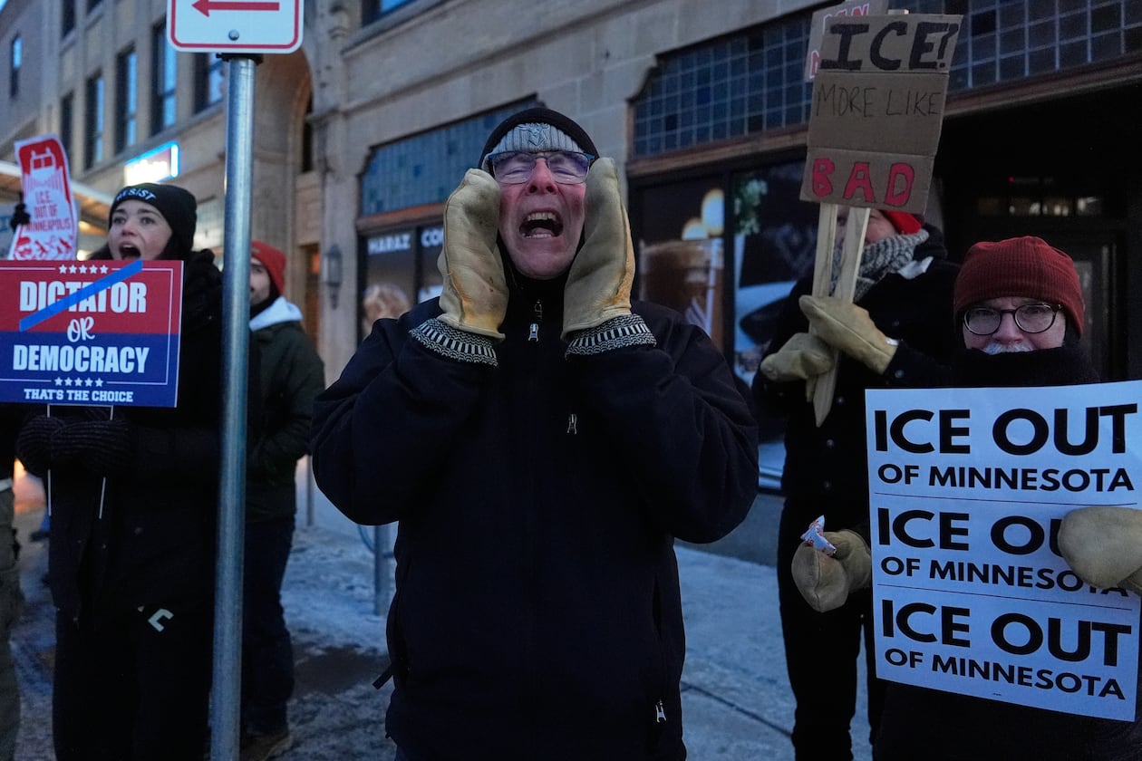A demonstrator shouts during a rally against federal immigration enforcement on Wednesday, Jan. 28, 2026, in Minneapolis. (Julia Demaree Nikhinson/AP)