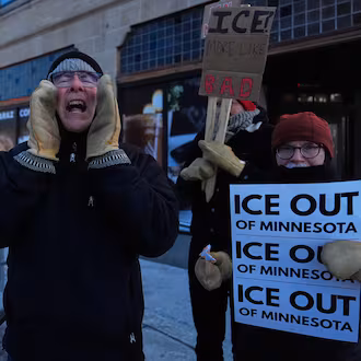 A demonstrator shouts during a rally against federal immigration enforcement on Wednesday, Jan. 28, 2026, in Minneapolis. (Julia Demaree Nikhinson/AP)
