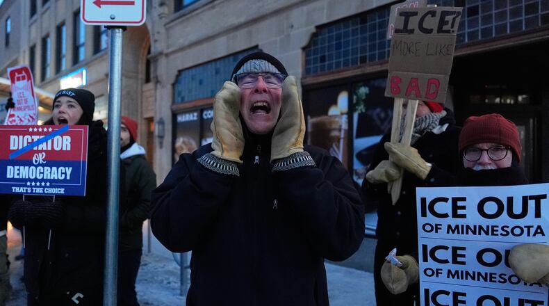 A demonstrator shouts during a rally against federal immigration enforcement on Wednesday, Jan. 28, 2026, in Minneapolis. (Julia Demaree Nikhinson/AP)